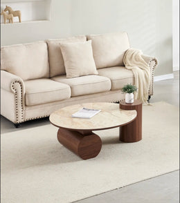 A RONDIN WALNUT CERAMIC COFFEE TABLE WITH MDF BASE. MEASUREMENT 90X45CM