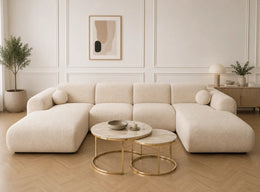 A PANORAMIC U-SHAPED SOFA WITH UPHOLSTERY FABRIC IN BEIGE FINISH. MEASUREMENT 165X370X165CM