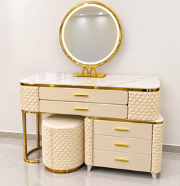 AN ELEGANT DRESSING TABLE IN BEIGE AND GOLD FINISH WITH PUFF AND LED MIRROR AND A LOT OF STORAGE OPTION . MEASUREMENT 90X40X79CM