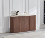 THE CALYPSO SIDEBOARD IS A 4 DOOR WALMUT MDF SIDEBOARD WITH A SCARTCH AND HEAT RESISATNT TRAVERTINE CERAMIC TOP AND STAINLESS STEEL DETAILS , MEASURING 180X40X100CM