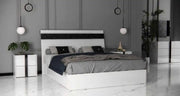 LUXY BEDROOM SET IN WHITE/BLACK FEATURES A MODREN AND ELEGANT DESIGN. THE SET INCLUDES BED 160X200CM  WITHOUT MATRESS AND 4 DOORS WARDROBE WITH 164X59X210CM AND DRESSING TABLE WITH 3 DRAWERS 100X44X77CM AND MIRROR AND 2 SIDETABLE 55X37X48CM