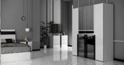 LUXY BEDROOM SET IN WHITE/BLACK FEATURES A MODREN AND ELEGANT DESIGN. THE SET INCLUDES BED 160X200CM  WITHOUT MATRESS AND 4 DOORS WARDROBE WITH 164X59X210CM AND DRESSING TABLE WITH 3 DRAWERS 100X44X77CM AND MIRROR AND 2 SIDETABLE 55X37X48CM