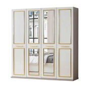 PARIS BEDROOM SET IN BEIGE/GOLD FEATURES A MODREN AND ELEGANT DESIGN . THE SET INCLUDES A 160X200CM BED WITHOUT MATRESS AND 4 DOORS WARDROBE 180X60X205CM AND 3 DRAWERS COMMODE 95X44X80CM AND MIRROR 70X2X80CM AND 2 BEDSIDETABLE 53X44X50CM