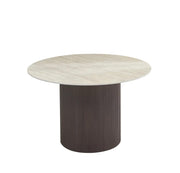 MESA DE COMEDOR REDONDA BAIETAA CON BASE EFECTO NOGAL Y CUBIERTA CERÁMICA DE TRAVERTINO MATE. MIDE 120X75CM.
