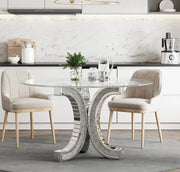 LA MESA DE COMEDOR ECALT CUENTA CON UNA SUPERFICIE DE ESPEJO QUE APORTA UN TOQUE DE GLAMOUR Y ELEGANCIA MODERNA, CON MEDIDAS DE 130X75 CM.