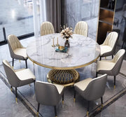 DELUXE DINING TABLE FEATURES A GOLD BASE WITH A WHITE MARBLE EFFECT TOP COMBINING MODREN ELEGANCE AND REFINED STYLE 130X75CM