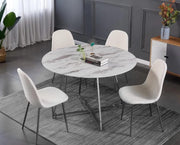 HELOISE ROUND DINING TABLE FEATUES SILVER METAL LEGS WITH A WHITE MARBLE EFFECT TOP COMBINING MODREN STYLE AND ELEGANCE 120X75CM