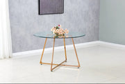 MESA DE COMEDOR REDONDA HELOISE CON PATA COLOR ORO ROSA Y CUBIERTA DE CRISTAL TRANSPARENTE, QUE COMBINA ELEGANCIA MODERNA 120X75CM