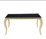 BAROQUE DINING TABLE FEATURES A GOLD BASE WITH A BLACK MARBLE EFFECT TOP COMBINING CLASSIC ELEGANCE 150X90X75CM