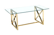 LA MESA DE COMEDOR KENSY CUENTA CON UNA BASE DORADA Y UNA CUBIERTA DE CRISTAL TRANSPARENTE QUE COMBINAN UN DISEÑO MODERNO Y ELEGANTE 180X90X75CM