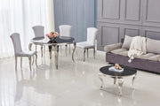 BAROQUE ROUND DINING TABLE WITH A BLACKAND SILVER BASE COMBINING CLASSIC DESIGN WITH A MODREN TOUCH 130X75CM