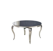 MESA DE COMEDOR REDONDA BARROCA CON TAPA DE MÁRMOL NEGRO Y PATAS PLATEADAS CON MATERIAL Y DISEÑO CLÁSICOS 130X75CM
