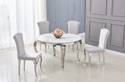 BAROQUE ROUND DINING TABLE FEATURES A SILVER BASE WITH A WHITE MARBLE EFFECT TOP COMBINING CLASSIC ELEGANCE WITH A MODREN TOUCH 130X75CM