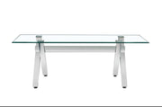 LXE DINING TABLE FEATURES A SILVER BASE WITH A TRANSPARENT GLASS TOP COMBINING SLEEK MODREN DESIGN AND LEGANCE 150X90X75CM