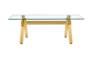 LXE DINING TABLE FEATURES A GOLD BASE WITH A TRANSPARENT GLASS TOP COMBINING SLEEK MODREN DESIGN AND LEGANCE 150X90X75CM