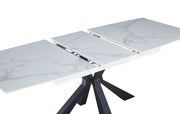 EXTENDABLE DINING TABLE FEATURES A WHITE MARBLE EFFECT CERAMIC TOP WITH A BLACK METAL FEETS 160/200X90X75CM