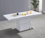 EXTENDABLE 135/170CM DINING TABLE FEATURES A AUTOMATIC LIFT AND EXTENSION SYSTEM WITH WHITE COLOR.