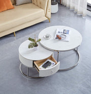 GIGOGNE 80+60CM FEATURES A WHITE MARBLE EFFECT CERAMIC TOP WITH SILVER SAMIRA STYLE LEGS.
