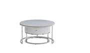 GIGOGNE 80+60CM FEATURES A WHITE MARBLE EFFECT CERAMIC TOP WITH SILVER SAMIRA STYLE LEGS.