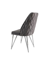 NICOLE CHAIRS IN DARK GREY VELVET SEAT AND SILVER FEETS.