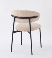 LULU CHAIRS WITH BLACK METAL LEGS IN BEIGE RIBBED FABRIC.