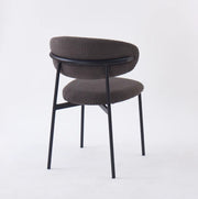 LULU CHAIRS WITH BLACK METAL LEGS IN GREY RIBBED FABRIC.