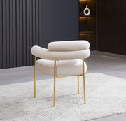 BULLE CHAIRS IN BEIGE VELVET WITH GOLD LEGS.