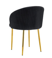 CARLITA CHAIRS IN BLACK VELVET AND GOLD LEGS.