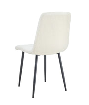 ELISA CHAIR WITH BLACK METAL LEGS IN TEDDY FABRIC.