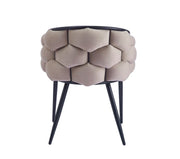 BALLON ARMCHAIR IN TAUPE WITH BLACK METAL LEGS.