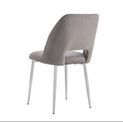 BRITTANY ARMCHAIR IN GREY  VELVET WITH SILVER LEGS.MEASURING 50X45X81.5CM