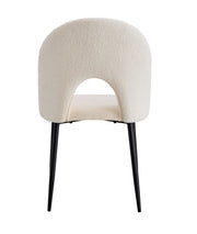 TEDDY CHAIRS IN BEIGE TEDDY FABRIC WITH BLACK METAL FEETS.