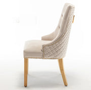 QUILTED STUDDED RING CHAIR IN BEIGE VELVET AND GOLD FINISH.