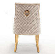 QUILTED STUDDED RING CHAIR IN BEIGE VELVET AND GOLD FINISH.