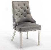 QUILTED STUDDED RING CHAIRS WITH SILVER FEETS AND ANTHRACITE VELVET.