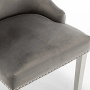 QUILTED STUDDED RING CHAIRS WITH SILVER FEETS AND ANTHRACITE VELVET.