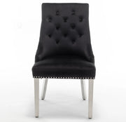 SILLÓN ANILLO ACOLCHADO EN TERCIOPELO NEGRO Y PATAS PLATEADAS.
