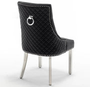 SILLÓN ANILLO ACOLCHADO EN TERCIOPELO NEGRO Y PATAS PLATEADAS.