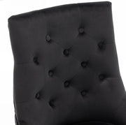 SILLAS DE ANILLO ACOLCHADAS CON TERCIOPELO NEGRO Y PATAS DORADAS.