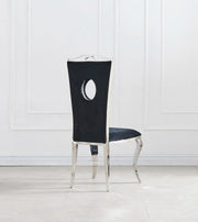 ROYAL CHAIR WITH SILVER FEETS AND BLACK LEATHER FINISHING.