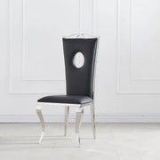 ROYAL CHAIR WITH SILVER FEETS AND BLACK LEATHER FINISHING.
