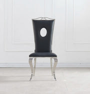 ROYAL CHAIR WITH SILVER FEETS AND BLACK LEATHER FINISHING.