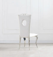 ROYAL CHAIR WITH SILVER FEETS AND WHITE LEATHER FINISHING.