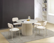 AZRA CHAIR WITH TAUPE METAL LEGS AND A HERITAGE SAND FABRIC SEAT.