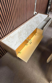 TV CABINET WITH WOOD FINISH WHITE MARBLE TOP WITH STRORAGE WITH DRAWERS AND FLIP DOWN DOORS.MEASURING 200CM
