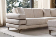 MODERN L-SHAPED SECTIONAL SOFA IN BEIGE FABRIC WITH DEEP CUSHIONED SEATING , MATCHING PILLOWS AND ELEGANT WAKNUT FINISH LEGS.MEDIDAS 322X282CM