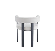 VAIANA CHAIR WITH BLACK METAL LEGS AND BEIGE VELVET SEAT.