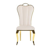 NANA PHALLE CHAIR WITH GOLD LEGS AND BEIGE VELVET SEAT.