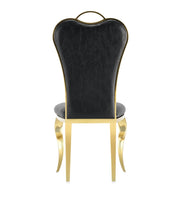 NANA PHALLE CHAIR WITH GOLD LEGS AND BLACK FAUX LEATHER SEAT.