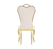 NANA PHALLE CHAIR WITH GOLD LEGS AND BEIGE VELVET SEAT.